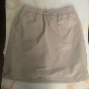 I am selling a cute khaki midi skirt!!